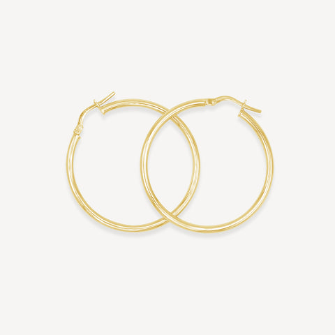 Aretes tipo argolla de oro grande de 14 k