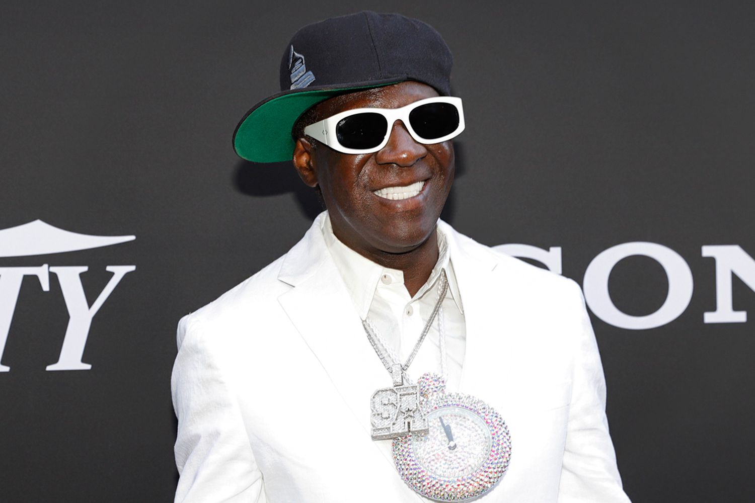 Flavor Flav Shares the Inspiration Behind His Iconic Clock Chain | Gold Presidents