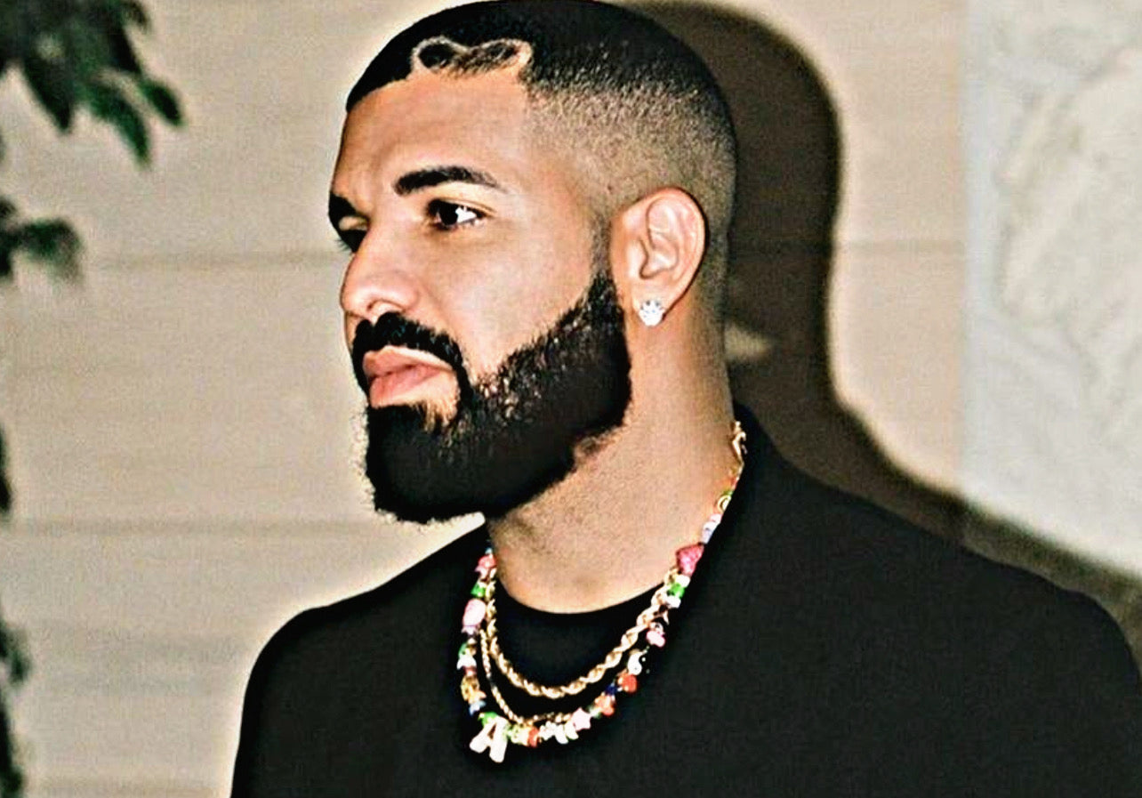 Drake Reveals 50-Carat Diamond Dog Leash Chain in "First Person Shooter" Music Video