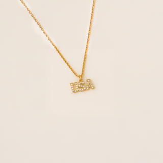 Collier personnalisé avec nom et lettres en blocs d'or jaune - 9 lettres